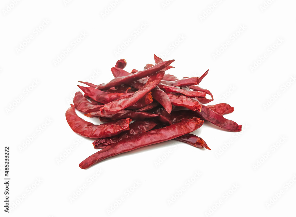 Dried red chilies that have been dried in the sun It has a very spicy taste.  isolated on a white background.