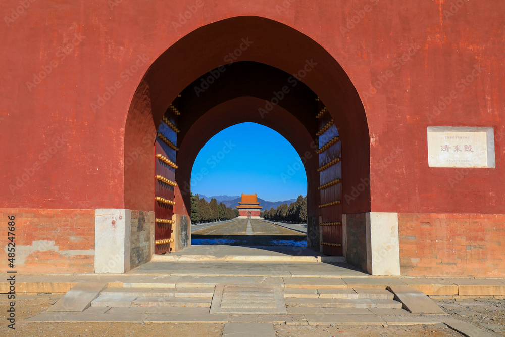 the architectural landscape of the large stele building with red gate is in Dongling Mausoleum of the Qing Dynasty, China