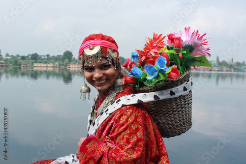 A women wearing a ethnic dress of Kashmiris in India photo