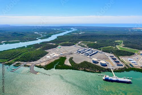 Aerial shot of liquified natural gas plant and LNG ship on Curtis Island, Queensland