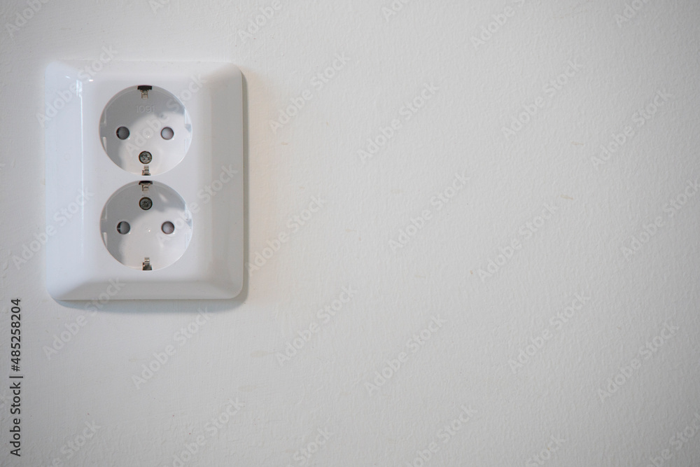 A double European electrical outlet on a wall. A double European electrical outlet on a wall.