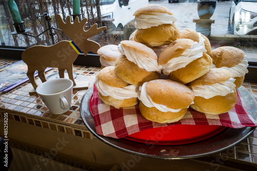 Photography Stockholm, Sweden A pile of semlor in bakery shop.
