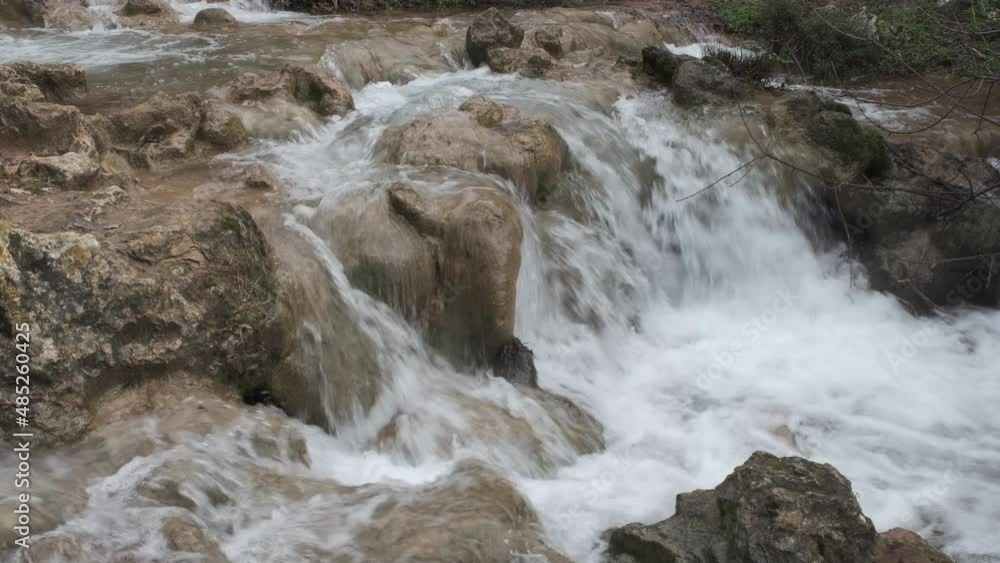 cascading waterfall after heavy rain in the mountains of Galilee cascading waterfall after heavy rain in the mountains of Galilee