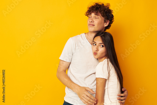 cute young couple hug friendship relationship fun isolated background unaltered