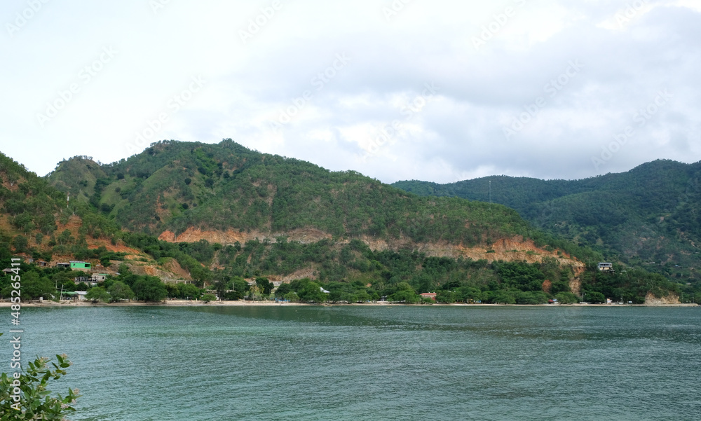 Tropical exotic paradise view of Cristo Rei Beach in Dili, Timor Leste.