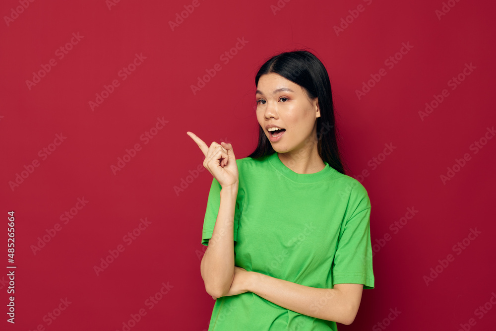 pretty brunette casual wear emotions posing fashion red background unaltered pretty brunette casual wear emotions posing fashion red background unaltered