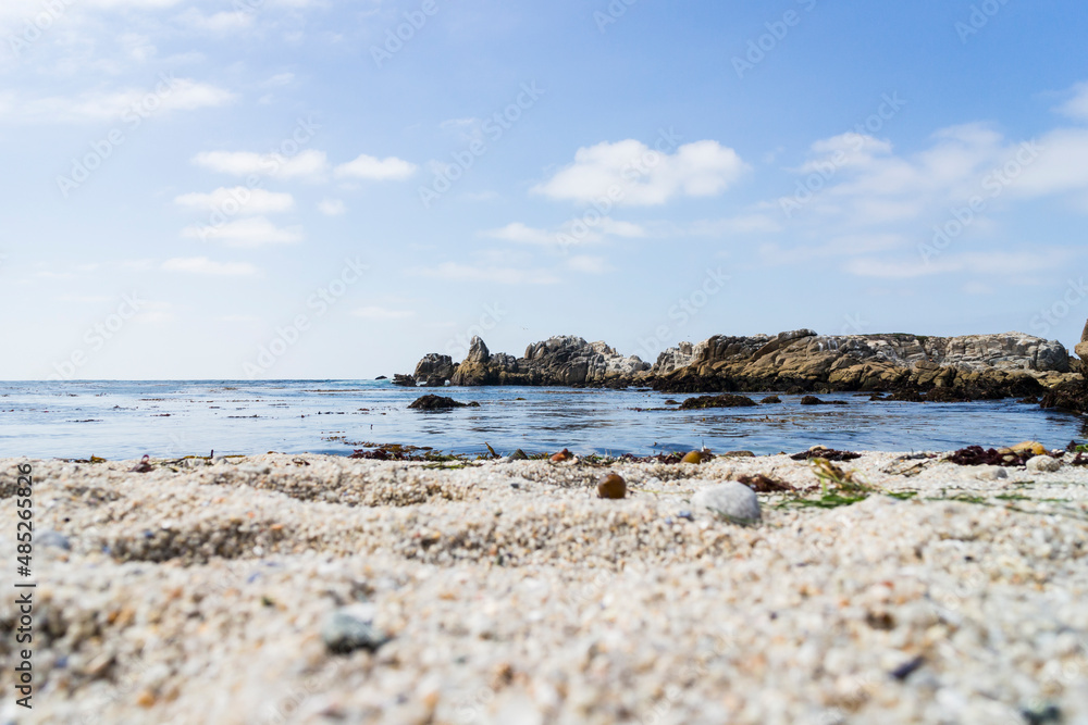 beach, sand, rocks, and water