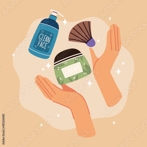 hands with skin care bottles