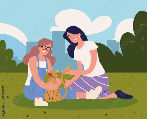 women playing with cat