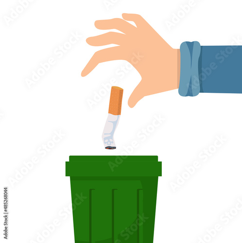 Hand putting cigarettes in trash bin flat