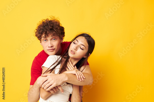 portrait of a man and a woman together posing emotions close-up isolated background unaltered