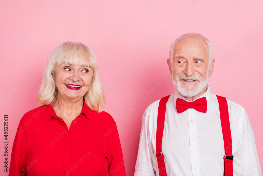 Photo of pensioner retired stylish trendy man lady look shy first meet isolated pastel color background Photo of pensioner retired stylish trendy man lady look shy first meet isolated pastel color background