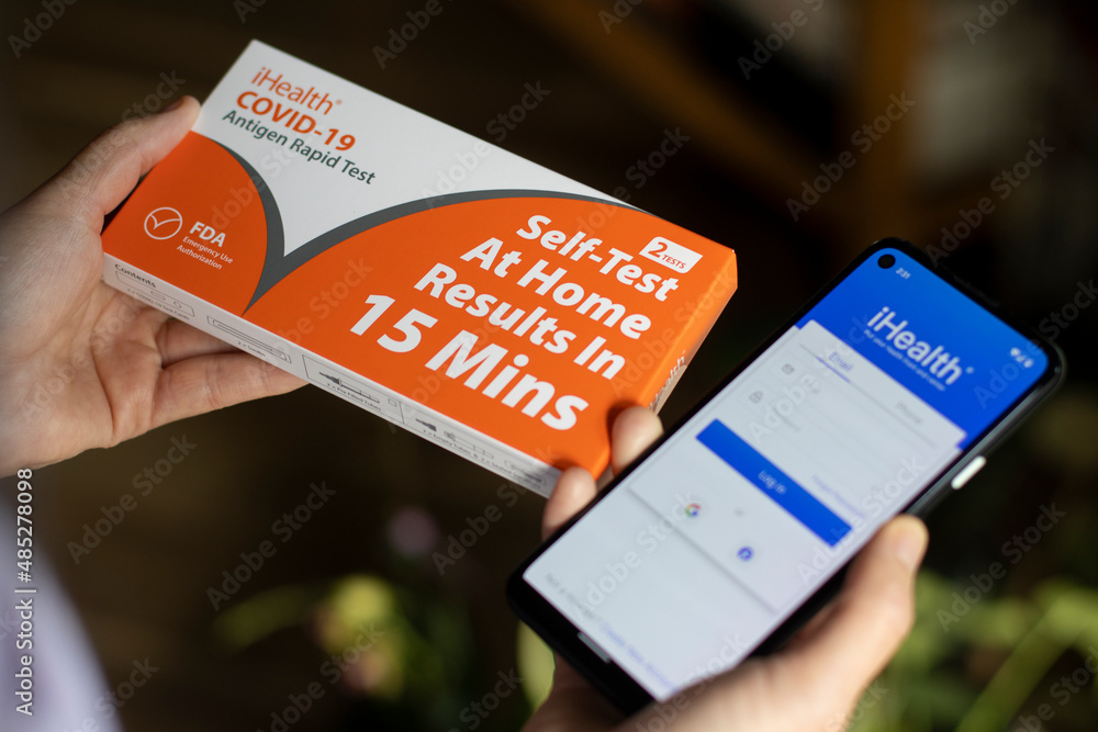 Portland, OR, USA Feb 5, 2022 A woman's hands holding a free iHealth