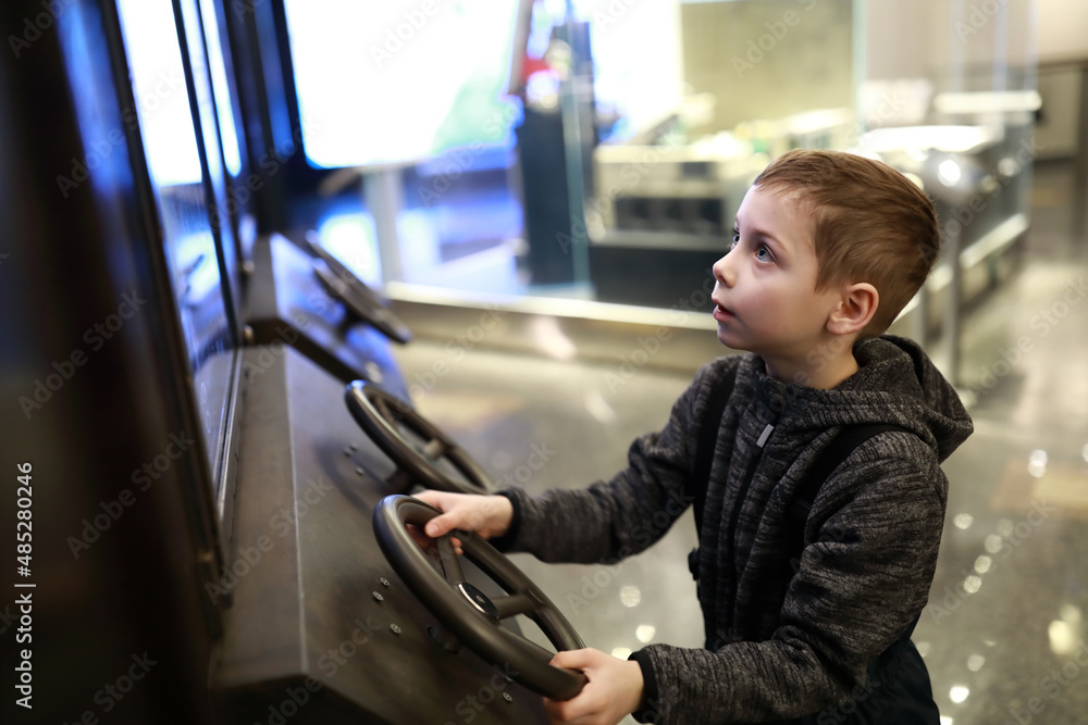 Child playing car race game