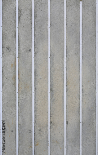 Cement wall with vertical striped and high detail as texture background