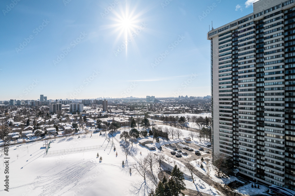 Toronto skyline snow condos blue skies 
