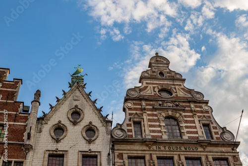 Travel photograph, street view in a beautiful sunny September day with some clouds, Leuven, Belgium © lightcaptured