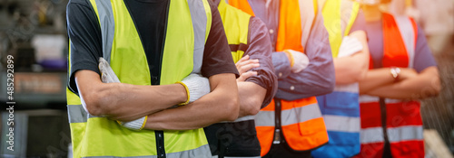 close up half body cropping image banner. Team engineer technician and foreman arms crossed work success, business corporate industry teamwork. technician successful concept. photo