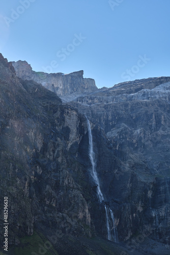 Cirque de Gavarnie waterfall with the first rays of the sun, Monte Perdido massif. France, Occitanie, Hautes Pyrenees