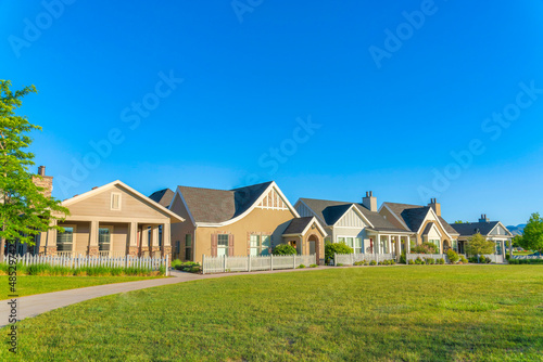 Wallpaper Mural Fenced residential houses with path and lawn at the front in Daybreak, South Jordan, Utah Torontodigital.ca
