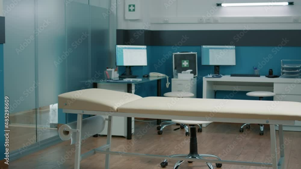Empty medical office used by doctor and nurse to do checkup visit. Nobody in cabinet where physician does health care examination at consultation appointment. Modern instruments Empty medical office used by doctor and nurse to do checkup visit. Nobody in cabinet where physician does health care examination at consultation appointment. Modern instruments