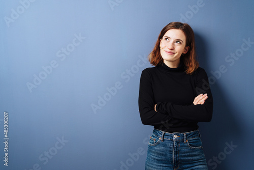 Photography Young woman looking up with a contented smile