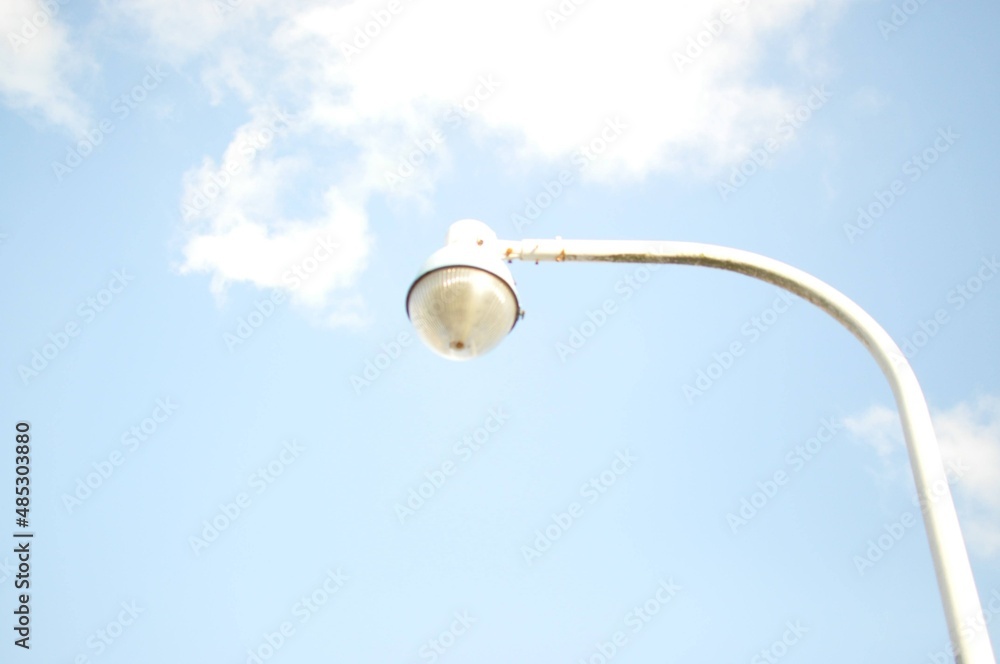 street lamp on blue sky