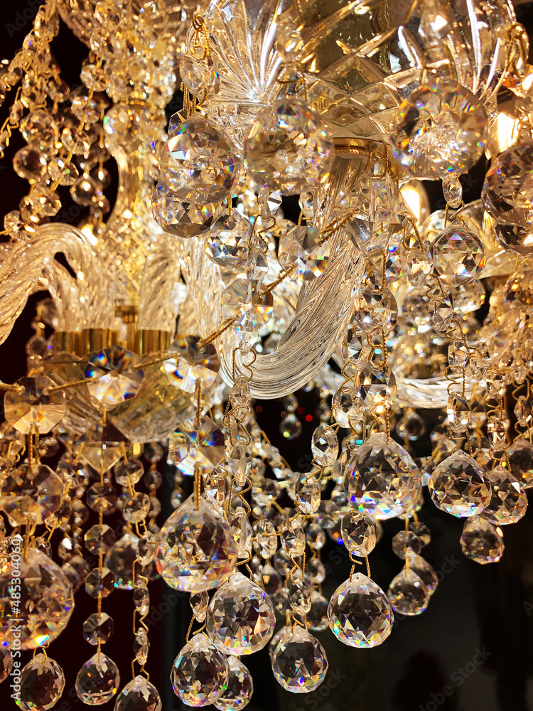 Beautiful twinkle crystal chandelier close up, warm light Beautiful twinkle crystal chandelier close up, warm light