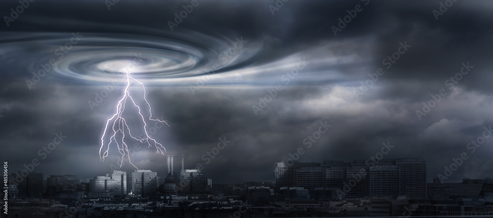 dark city silhouette in the eye of the storm, lightning on black cyclone sky background, symbolic concept for blackout, financial crash, climate change or other disasters
