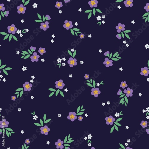 Seamless vintage pattern. Purple and white flowers, green leaves. Dark blue background. vector texture. fashionable print for textiles, wallpaper and packaging.