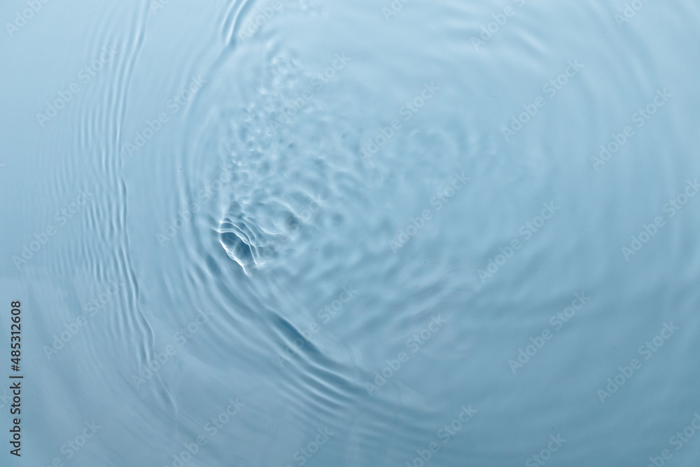 Blue water texture, blue pure water surface with waves and ripples. Flat lay, copy space Blue water texture, blue pure water surface with waves and ripples. Flat lay, copy space