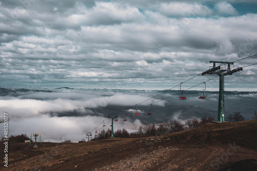 A ski lift is a mechanism for transporting skiers up a hill. Ski lifts are typically a paid service at ski resorts.