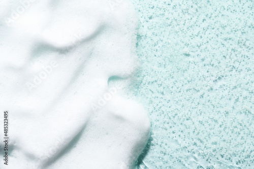 Obraz na płótnie Gentle white foam cleanser cosmetic product for professional skincare on textured turquoise surface close view from above w salonie