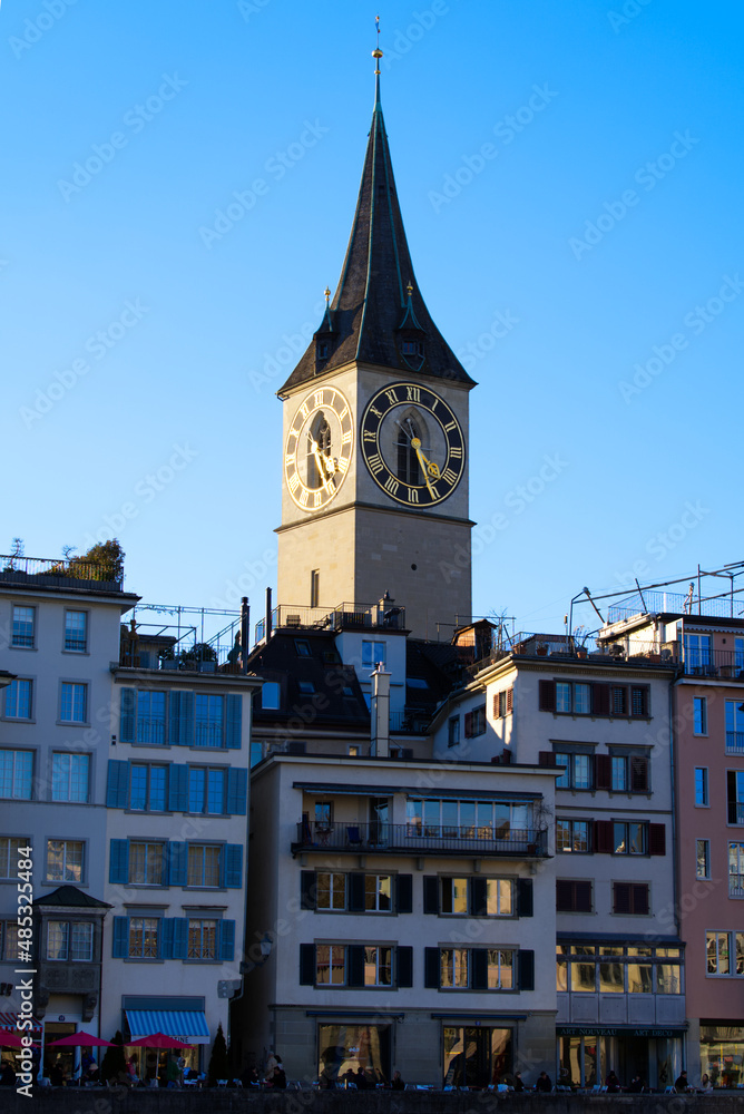 Church tower of medieval protestant church St. Peter at the old town of Zürich on a sunny winter day. Photo taken February 5th, 2022, Zurich, Switzerland.