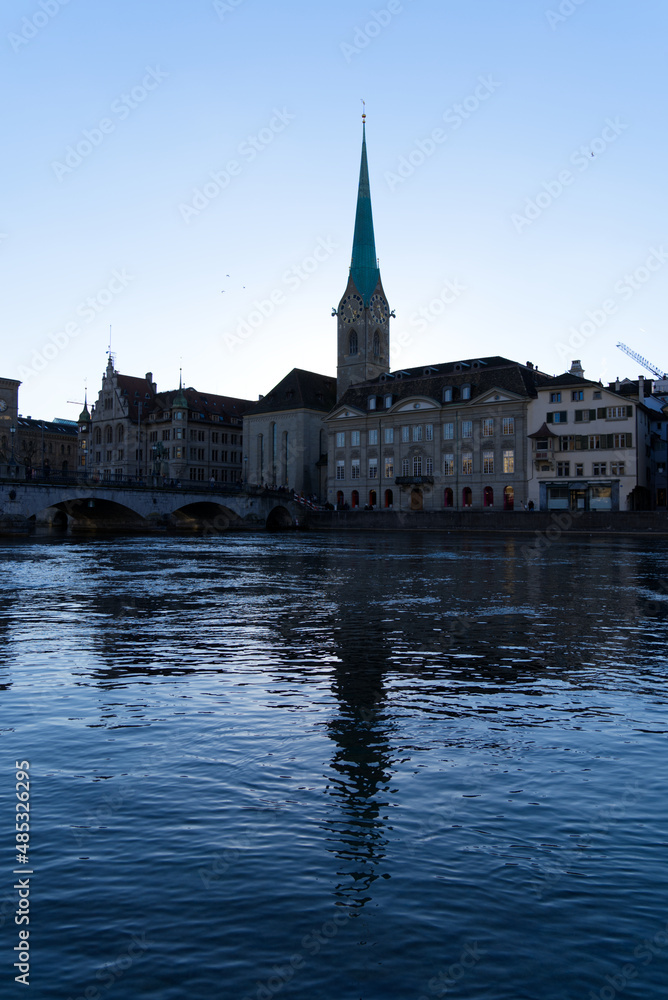 Church tower of medieval protestant church Women's Minster at the old town of Zürich on a sunny winter day. Photo taken February 5th, 2022, Zurich, Switzerland. Church tower of medieval protestant church Women's Minster at the old town of Zürich on a sunny winter day. Photo taken February 5th, 2022, Zurich, Switzerland.