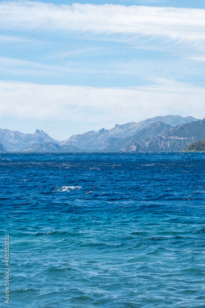 View of the lake in the mountains. Argentine Patagonia. Summer day in nature.
View of the lake in the mountains. Argentine Patagonia. Summer day in nature.