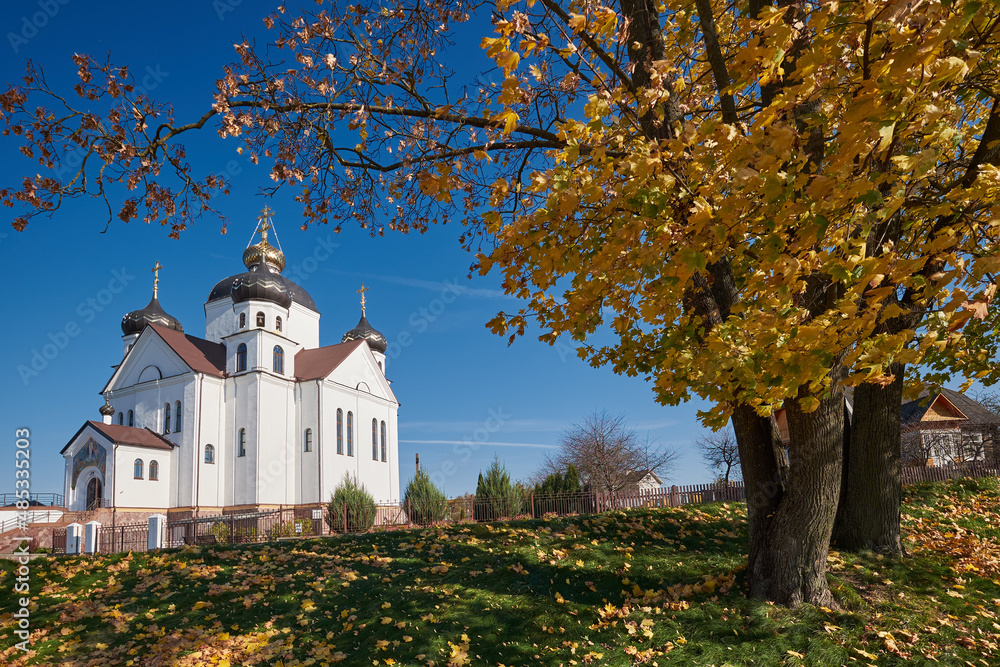Old ancient orthodox church of the Transfiguration of Jesus Christ church in an autumn landscape. Smorgon, Grodno region, Belarus.