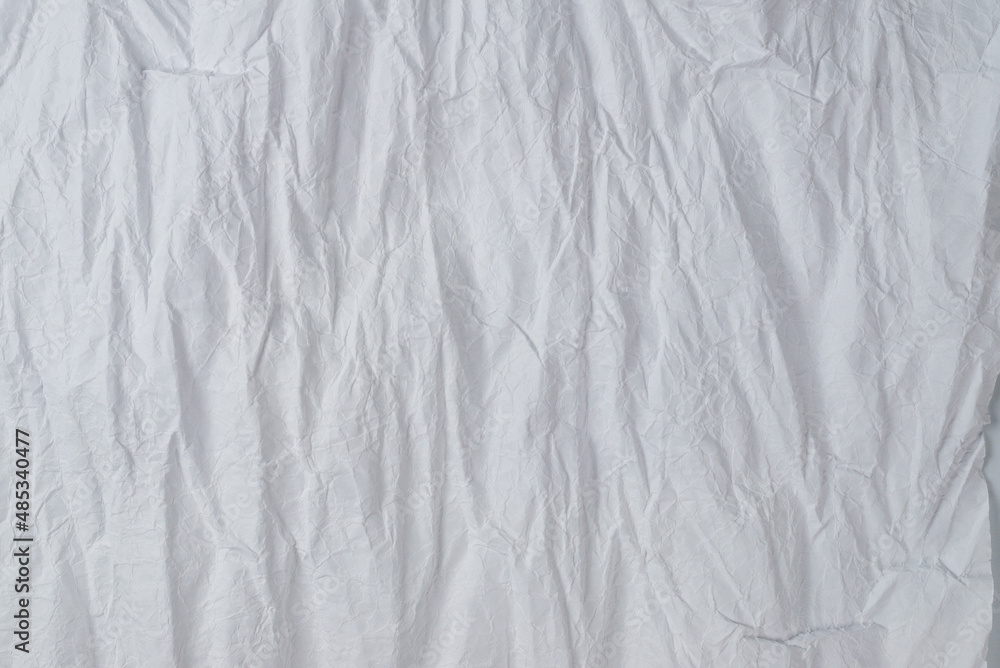 Crumpled white paper background. Crumpled white paper background.
