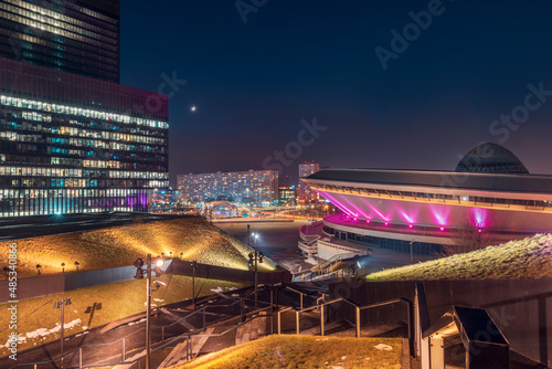 The panorama of Katowice seen from the roof of the ICC. View towards the roundabout. In the foreground, the Spodek sports hall and office buildings