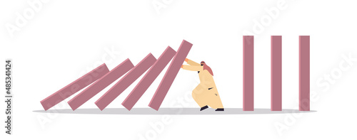 stressed arab businessman stopping domino effect crisis management chain reaction finance intervention conflict prevention
