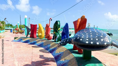 Holbox island pier colorful welcome letters and sign in Mexico. photo