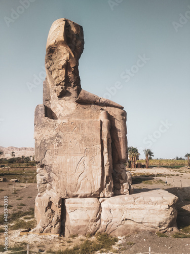 The Colossi of Memnon are two massive stone statues of the Pharaoh Amenhotep III, who reigned in Egypt during the Eighteenth Dynasty of Egypt photo