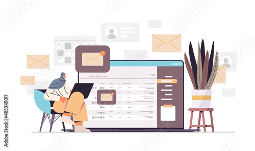 arab businesswoman sending or receiving letters email inbox message notification new unread mail business communication