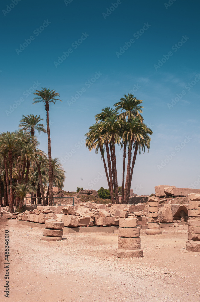 The Karnak Temple Complex, commonly known as Karnak, comprises a vast mix of decayed temples, pylons, chapels, and other buildings near Luxor, Egypt The Karnak Temple Complex, commonly known as Karnak, comprises a vast mix of decayed temples, pylons, chapels, and other buildings near Luxor, Egypt