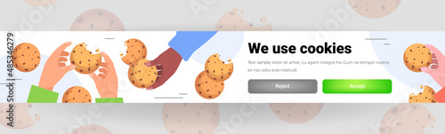 hands holding cookie protection of personal information internet web pop up we use cookies policy notification