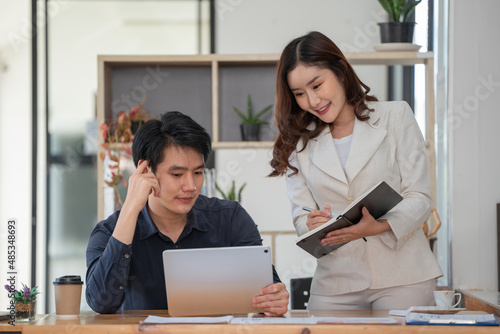 Young business team working with business report document on office desk. Brainstorming Business People Design Planning, Brainstorming Planning Partnership..