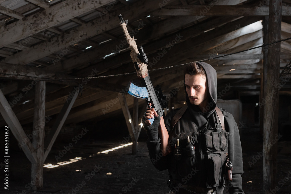 Mercenary soldier with a rifle concept. Mercenary soldier with a rifle concept.