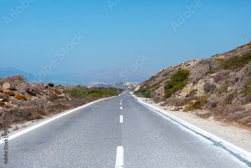 Asphalt road in countryside, Rodos island, Greece