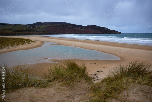 wild beach protected by its natural ecohabitat., Killahoey Strand near Dunfanaghy, Donegal, Ireland. wild atlantic way photo