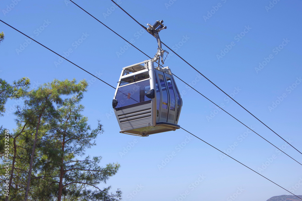 Turkey. Alanya. 09.16.21. People ride in cabins on a cable car.